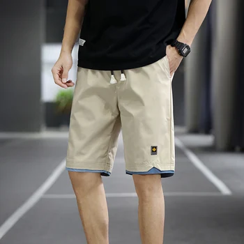 Летние мужские шорты 2023 года, спортивные брюки с пятью точками, Свободные повседневные пляжные брюки, Однотонная трендовая верхняя одежда, Шорты большого размера 8Xl